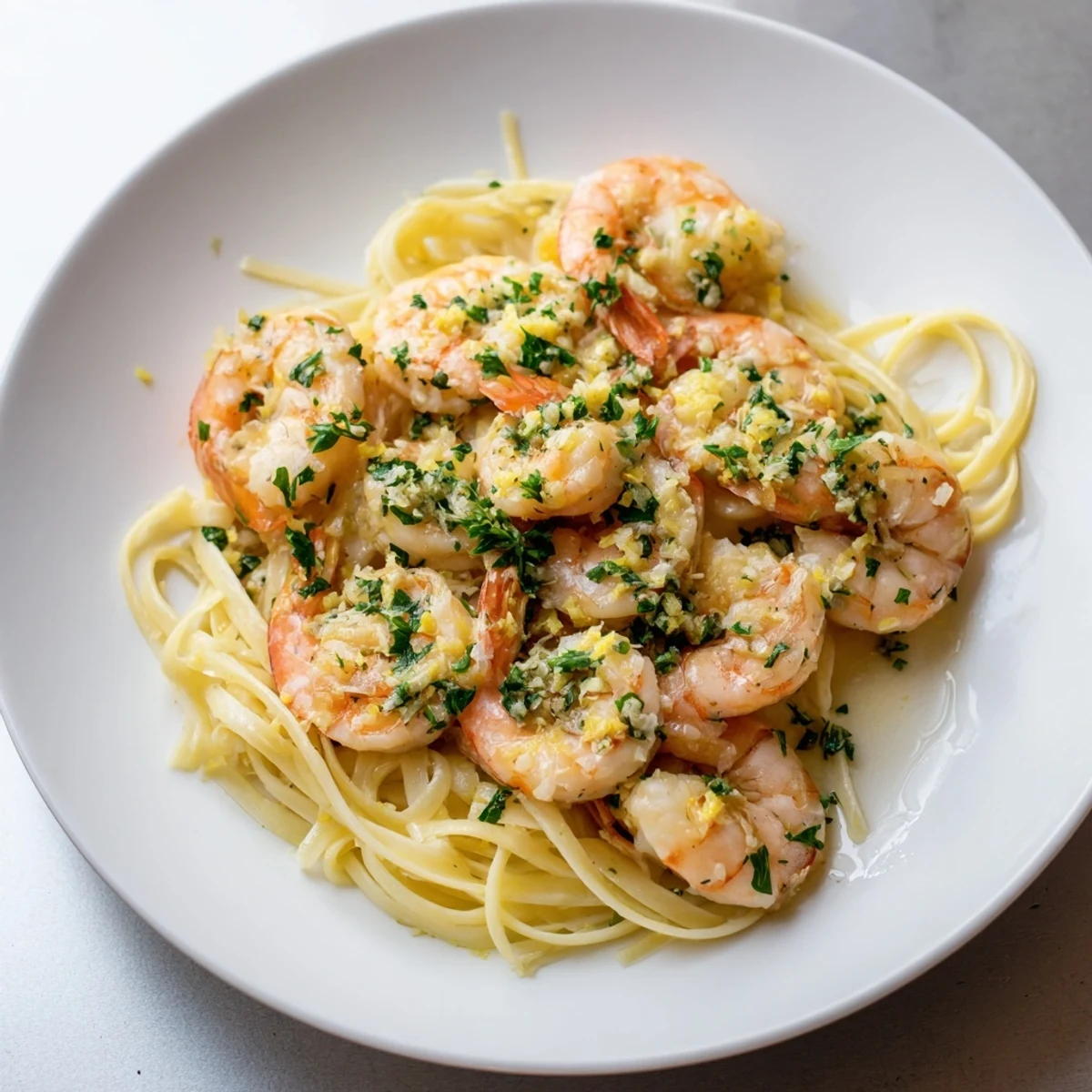 Golden brown Lemon Garlic Butter Shrimp Scampi, tossed in a flavorful sauce, ideal for crusty bread.