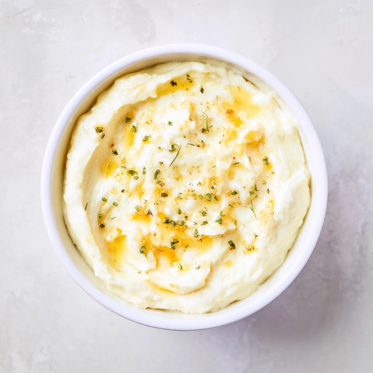 Creamy Garlic Aioli Dip, ready to serve with crispy fries; this dip's texture is velvety.