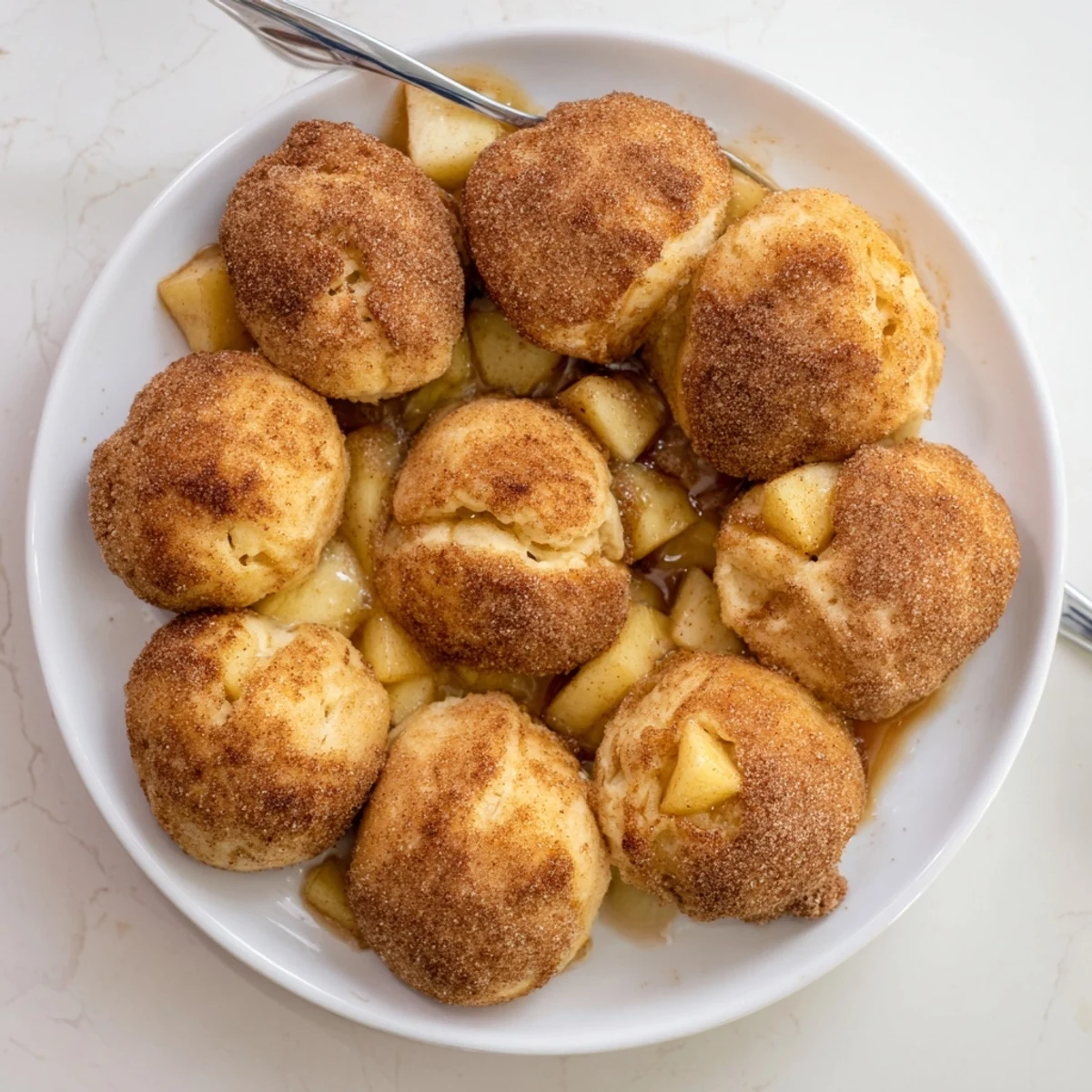 Warm caramel apple pie bombs oozing with melted caramel and spiced apple filling