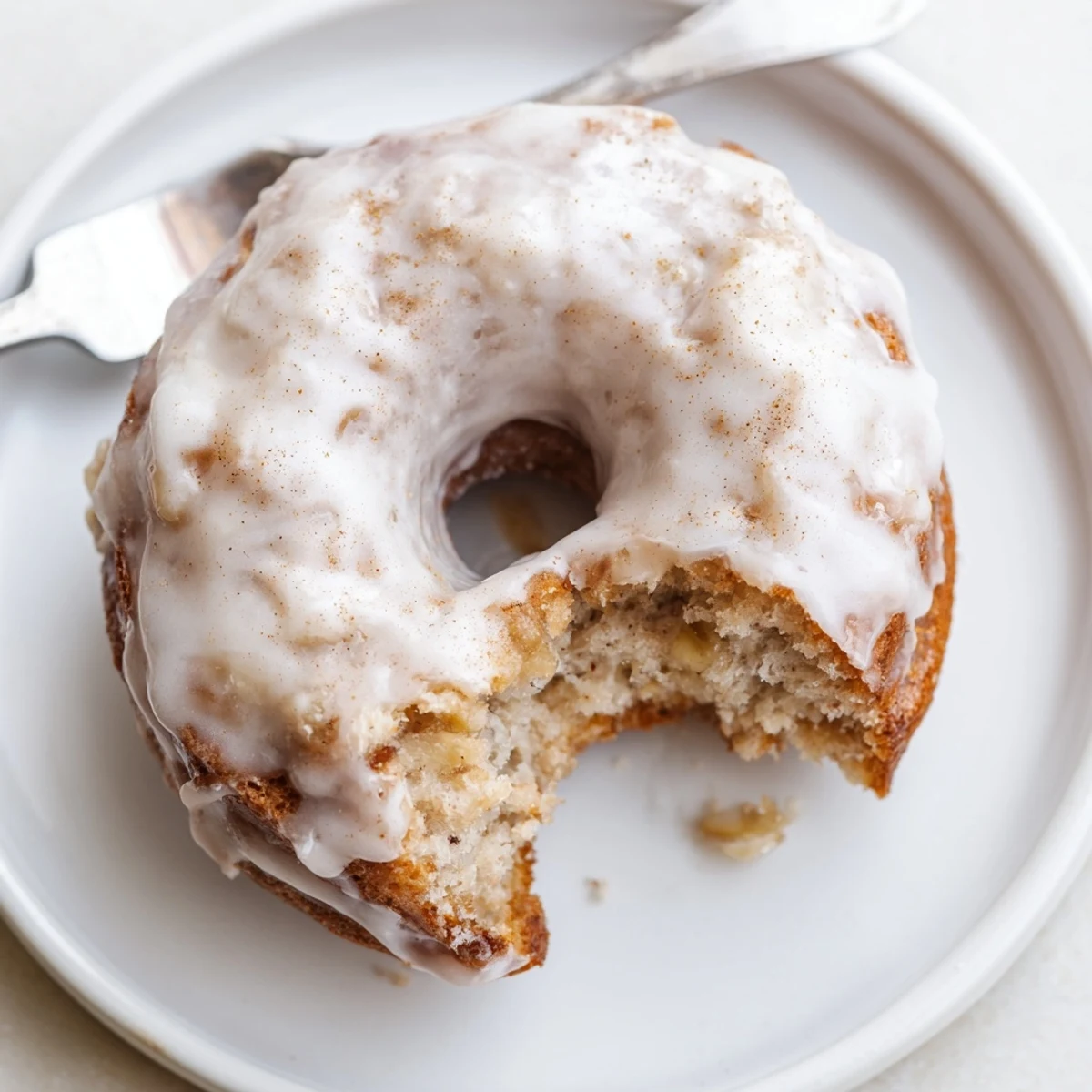 Baked Banana Donuts glazed with powdered sugar, perfect with morning coffee