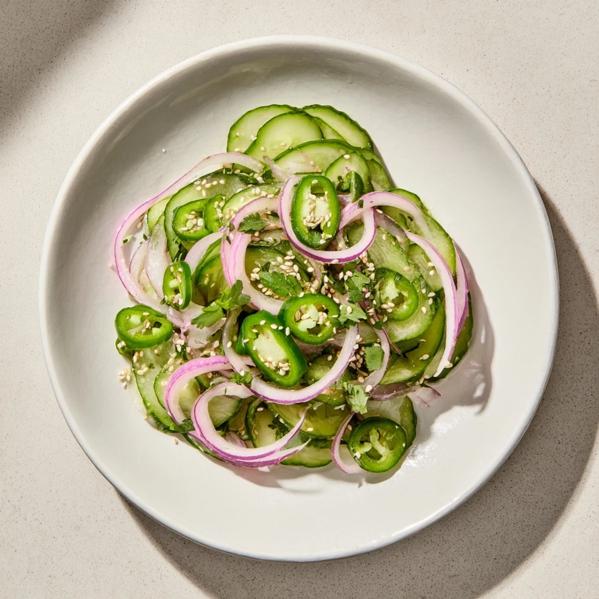Fresh honey lime cucumber salad with crisp cucumber slices in tangy lime dressing
